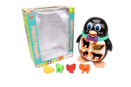 Яскрава і дуже приваблива іграшка в формі пінгвіна - чудовий розвиваючий подарун. . фото 2