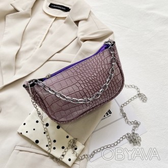 
ВИДЕООБЗОР
Женская сумочка багет
Маленькая сумочка в стиле кожи рептилии на цеп. . фото 1