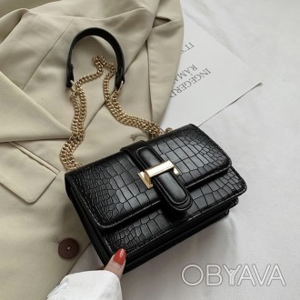 
Женская сумочка в стиле рептилии
Сумочка выполнена красиво и качественно! Имеет. . фото 1