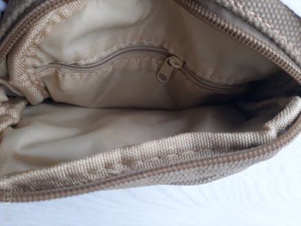 Мужская сумочка через плечо из плотной ткани

Практичная, хорошего качества
Д. . фото 6
