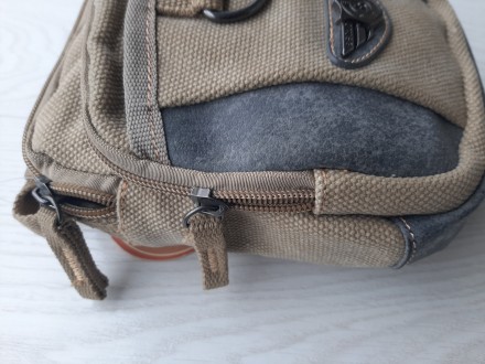 Мужская сумочка через плечо из плотной ткани

Практичная, хорошего качества
Д. . фото 7