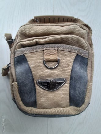 Мужская сумочка через плечо из плотной ткани

Практичная, хорошего качества
Д. . фото 3