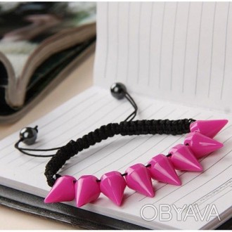 Плетеный браслет черного цвета с розовыми острыми подвесками. Длина 5,5 см. Вес:. . фото 1