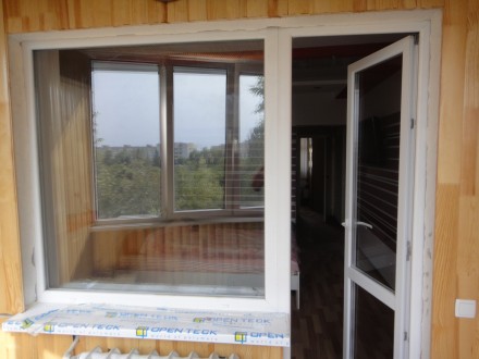 Балконний блок - це балконні двері з вікном, що монтуються в одну конструкцію і . . фото 2