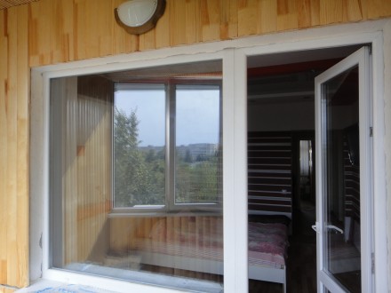 Балконний блок - це балконні двері з вікном, що монтуються в одну конструкцію і . . фото 4