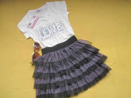 Новая  красивая  нарядная  юбка  на  7-9 лет.
Цвет - черный,сиреневый.
Пояс- ш. . фото 2
