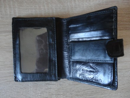 Кожаый мужской кошелек (черный)

Размер: 12.7 Х 9,7 см

Новый, Присутствуют . . фото 4