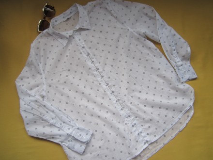 Качественная  тонкая  хлопковая  рубашка, р.42, C&A.
Цвет-белый с черным.
. . фото 2