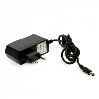 Імпульсний блок живлення Unitoptek 12V/1A в пластиковому корпусі для камер відеоспостереження 12 Вольт, 1 Ампер. Кропивницький. фото 1 Імпульсний блок живлення Unitoptek 12V/1A в пластиковому корпусі для камер відеоспостереження 12 Вольт, 1 Ампер. Кропивницький. фото 1