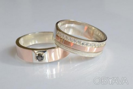 
	
	
	
	
	
	
Женское кольцо:
Вес: 4.5 г
Ширина: 6 мм
Мужское кольцо:
Вес: 3.7 г
. . фото 1