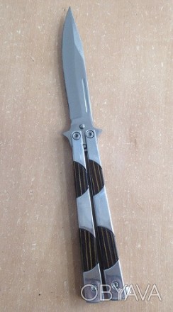 Нож-бабочка 22,5см В860
Нож бабочка имеет особую конструкцию, поскольку клинок с. . фото 1