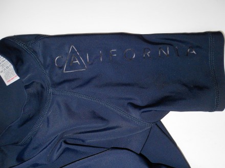 Темно синяя солнцезащитная пляжная футболка гидромайка  Next  Surf California
Э. . фото 6