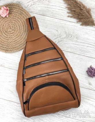Рюкзак изготовлен из натуральной кожи, застегивается на молнию
Внутри рюкзака од. . фото 1