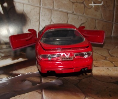 оллекционная модель
Pontiac FireBird 
1:32 (длина 15 см)
цвет - красный
фото. . фото 7