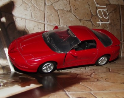 оллекционная модель
Pontiac FireBird 
1:32 (длина 15 см)
цвет - красный
фото. . фото 4