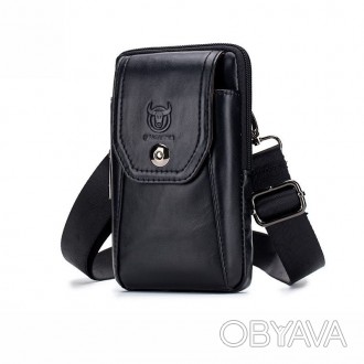 Кожаная напоясная сумка T0158A от бренда BULL может также носиться и как сумка н. . фото 1