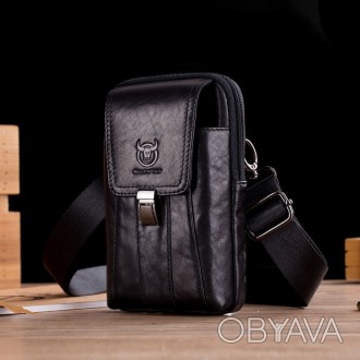 ​Кожаная напоясная сумка T0073A от бренда BULL, черного цвета. Этот аксессуар мо. . фото 1