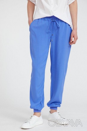 Женские летние брюки из вискозы Finn Flare на резинке снизу синего цвета, станут. . фото 1