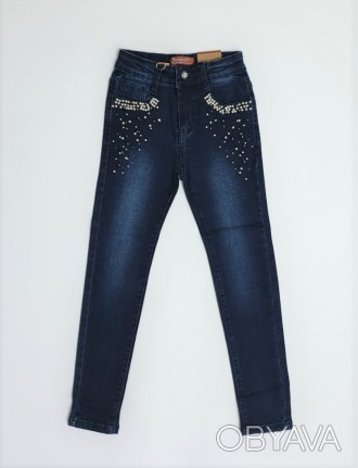 Темно-синие стрейчевые джинсы для девочки
Украшены бусинками и стразами (на закл. . фото 1