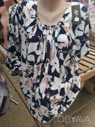 Жіноча літня ошатна блузка вільного крою з прикрасою є великі розміри.
Розміри: . . фото 1