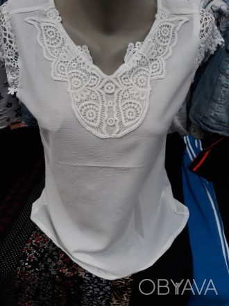Женская летняя легкая блуза с кружевными вставками.
Размеры: 44 46 48. Есть разн. . фото 1
