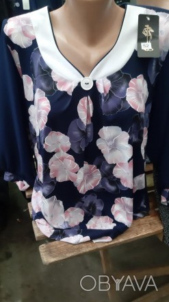 Женская блуза в цветочек, ткань масло, рукав 3/4 шифоновый.
Размеры 52, 54, 56, . . фото 1