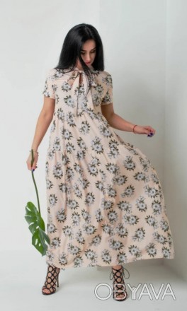 Жіноче плаття з квітковим принтом. 
Плаття вільного крою А-силуету та завищеною . . фото 1