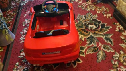 Електро мобіль дитячий
Марки BMW
Червоного коліру 
Усе працює від пульта.
По. . фото 2