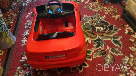 Електро мобіль дитячий
Марки BMW
Червоного коліру 
Усе працює від пульта.
По. . фото 1