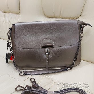 
Сріблястий колір (silver grey).
Шкіряна стильна класична сумка жіноча виробницт. . фото 1