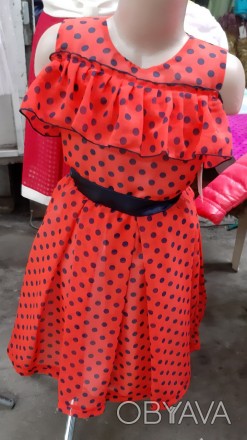 Платье для девочки нарядное в горошек и с рюшами.
Размеры: 104, 110, 116, 122.
Н. . фото 1