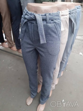 Женские брюки из теплой трикотажной ткани
Брюки женские классические с карманами. . фото 1