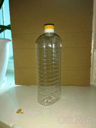 Пэт бутылка 700-950 мл, изготовлена из первичного сырья. Может применятся для ра. . фото 1