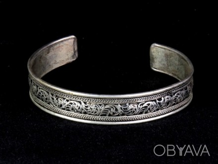 Браслет женский узоры тибетское серебро
Безразмерный, ширина 13 мм. Материал: ти. . фото 1