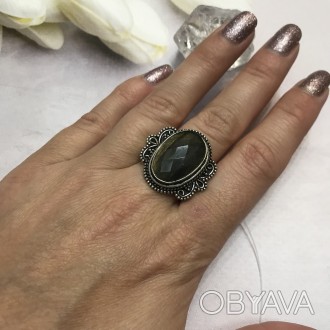 Предлагаем Вам купить элегантное кольцо с камнем лабрадор в серебре.
Размер 18,0. . фото 1