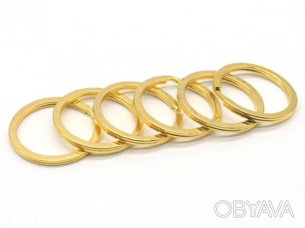 Кольцо для ключей (брелков), заводное, плоское, цвет золото , диаметр 30 мм.
Осн. . фото 1