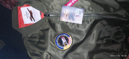 nasa MA-1 Эта летная куртка является действующим обмундированием астронавтов США. . фото 8