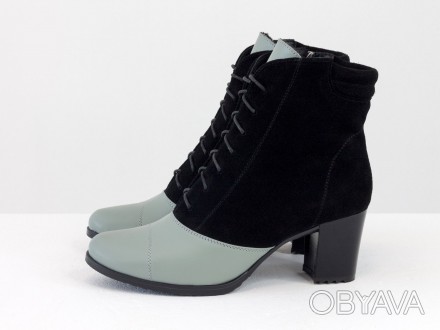 
Стильные женские ботинки выполнены из натуральной кожи и замши серого и черного. . фото 1