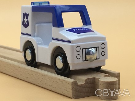 Полицейский игрушечный автомобиль со световыми и звуковыми эффектами.
Для детей . . фото 1