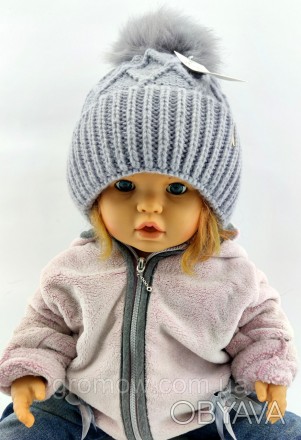 
 
Тёплая детская шапка. Очень приятная, мягкая и тёплая ткань. Подходит на дете. . фото 1