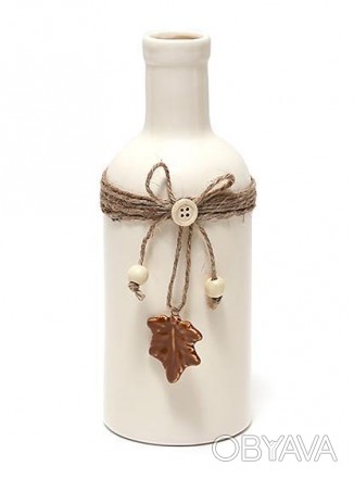 
Керамічна ваза в стилі Shabby Chic. Біла керамічна ваза у формі пляшки. Шийка в. . фото 1