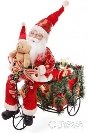 
Новорічна іграшка "Санта на велосипеді". Красива іграшка для декору і під ялинк. . фото 1