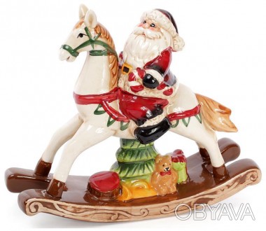 
Новорічна статуетка "Санта на конячці-гойдалці". Матеріал - кераміка. Розмір 23. . фото 1