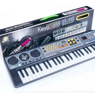 Синтезатор має 49 нотний клавішу. Музичний інструмент має безліч різних функцій,. . фото 6