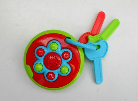 Яркие детские пластиковые  ключи с музыкальным брелоком 6 кнопок с разными звука. . фото 2