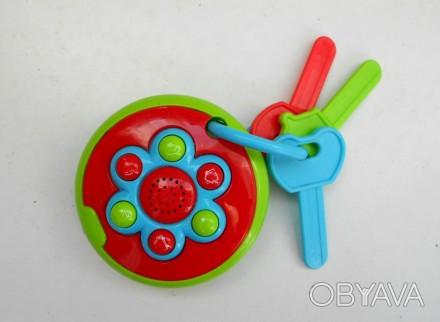 Яркие детские пластиковые  ключи с музыкальным брелоком 6 кнопок с разными звука. . фото 1