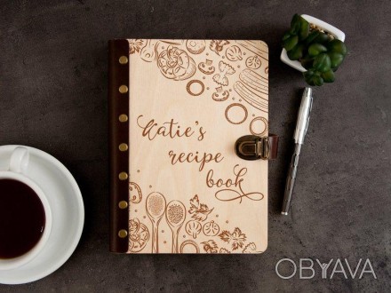 Книга для рецептів у дерев'яній обкладинці з гравіюванням
Кулінарна книга у дере. . фото 1