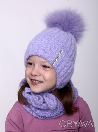 Теплая шапка на девочку
Теплая шапочка с завязками выполнена из мягкой пряжи, вн. . фото 1