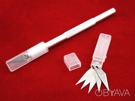 Скальпель (нож) изготовлен полностью из металла. Он имеет очень острое лезвие и . . фото 1