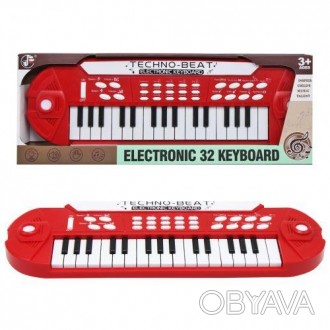 Пластиковое пианино на 32 клавиши. Есть кнопки с регулировкой громкости и темпа,. . фото 1